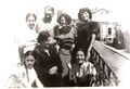Михайло Юрків з родиною та молоддю на балконі Народного дому.jpg