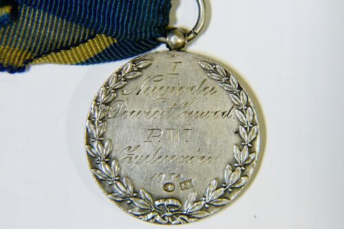 Срібна медаль повітові змагання Жидачів (1930) (зворот).jpeg